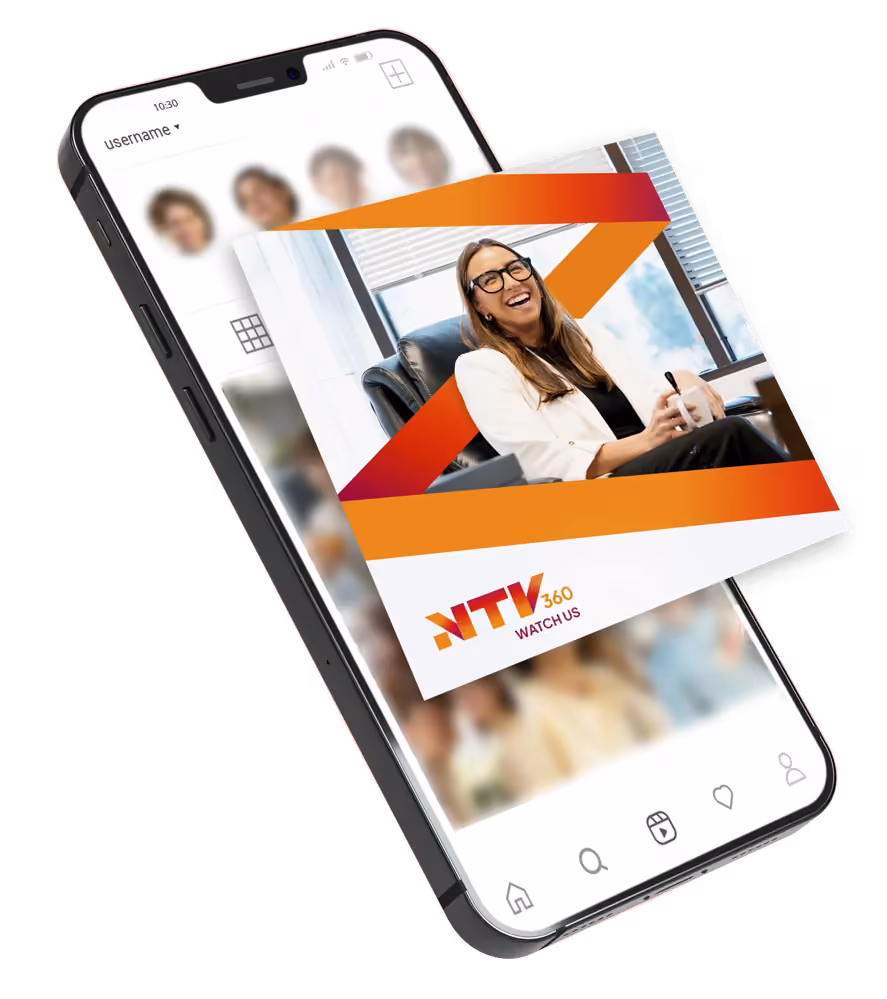 Local business owner reviewing ad content on an NTV360 screen